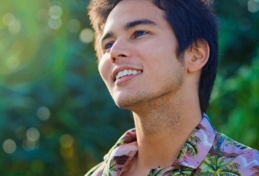 Young man in collared shirt outdoors